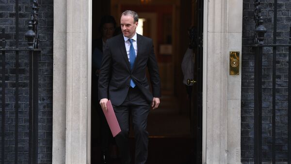 Britain's Foreign Secretary Dominic Raab leaves number 10 Downing street in central London after the daily Covid-19 briefing on April 15, 2020. - The new leader of Britain's opposition Labour Party urged the government today to set out how it plans to end the coronavirus lockdown, both to give people hope and avoid mistakes of the past. - Sputnik International