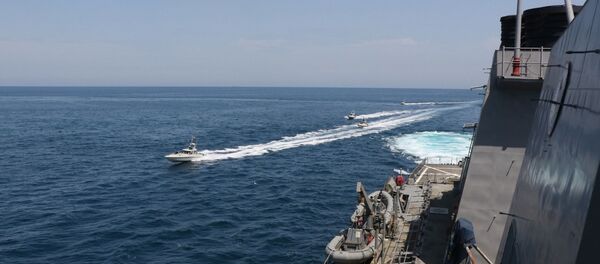 Iranian Islamic Revolutionary Guard Corps Navy (IRGCN) vessels conducted unsafe and unprofessional actions against U.S. Military ships by crossing the ships’ bows and sterns at close range while operating in international waters of the North Arabian Gulf. The guided-missile destroyer USS Paul Hamilton (DDG 60) is conducting joint interoperability operations in support of maritime security in the U.S. 5th Fleet area of operations. - Sputnik International