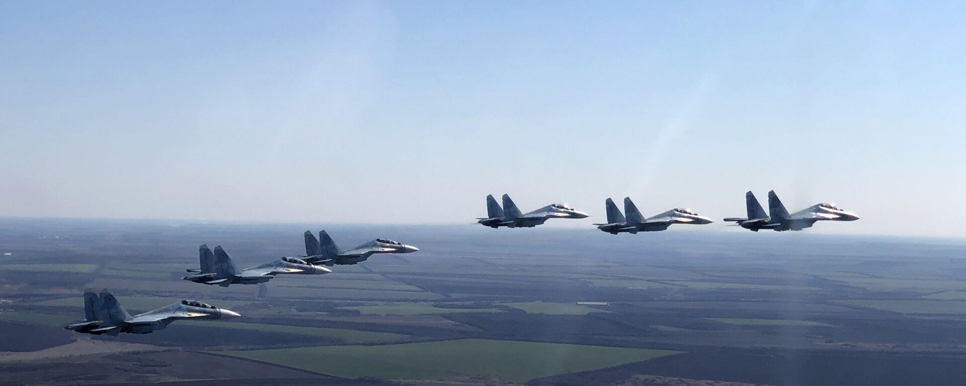 In this handout photo released by the Russian Defence Ministry, Su-30SM jet fighters of the 4th Air and Air Defence Forces Army of the Russian Southern Military District fly in formation during a rehearsal for the Victory Day parade in Rostov-on-Don, which marks the 75th anniversary of the victory over Nazi Germany in World War Two, in Rostov region, Russia - Sputnik International, 1920, 03.12.2021