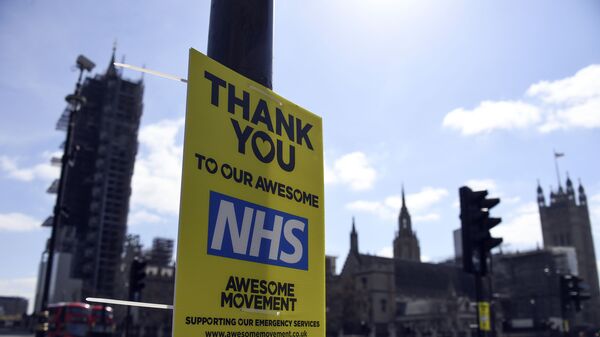 A message in support to the NHS is seen in Westminster, during to the Coronavirus outbreak, in London, Tuesday, April 14, 2020 - Sputnik International