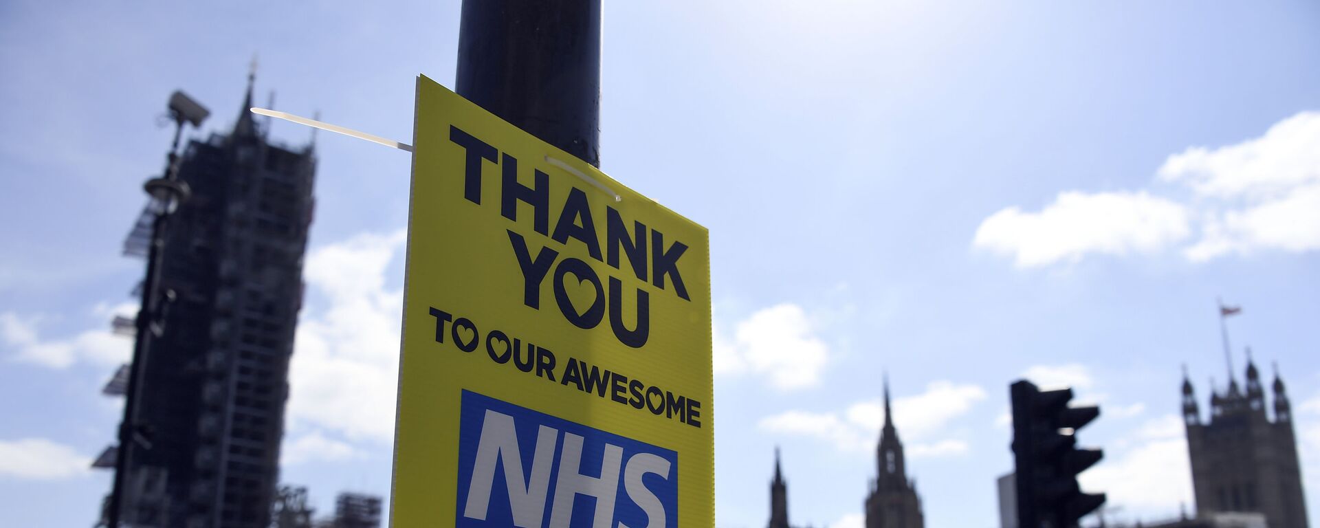 A message in support to the NHS is seen in Westminster, during to the Coronavirus outbreak, in London, Tuesday, April 14, 2020 - Sputnik International, 1920, 10.02.2021