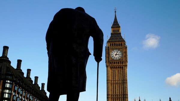 FILE PHOTO: The statue of Britain's former Prime Minister Winston Churchill is silhouetted in front of the Houses of Parliament in London January 24, 2015 - Sputnik International