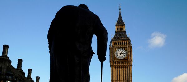 FILE PHOTO: The statue of Britain's former Prime Minister Winston Churchill is silhouetted in front of the Houses of Parliament in London January 24, 2015 - Sputnik International