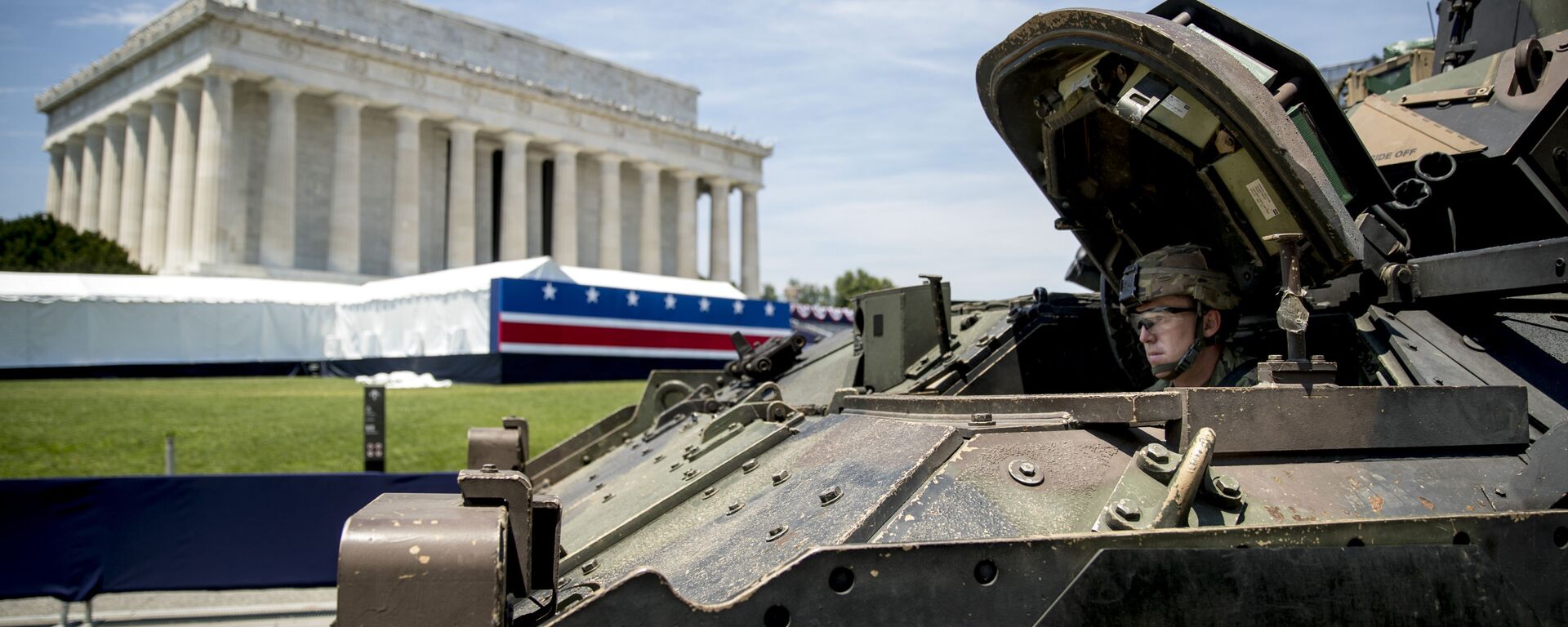 One of two Bradley Fighting Vehicles waits to be driven into place in front of the Lincoln Memorial for President Donald Trump's 'Salute to America' event honoring service branches on Independence Day, Wednesday, July 3, 2019, in Washington - Sputnik International, 1920, 07.01.2023
