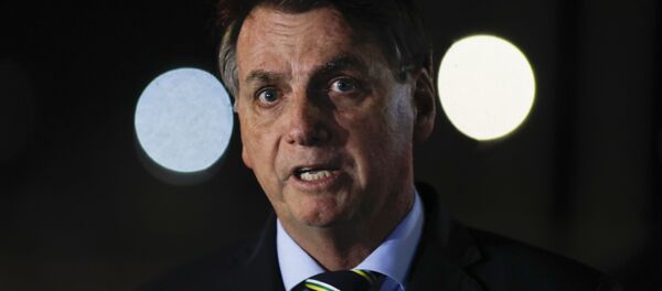 Brazil's President Jair Bolsonaro delivers a press conference at Palacio da Alvorada da presidencial residence, in Brasilia, on April 16, 2020. Brazil's President Jair Bolsonaro delivers a press conference at Palacio da Alvorada da presidencial residence, in Brasilia, on April 16, 2020. - Sputnik International