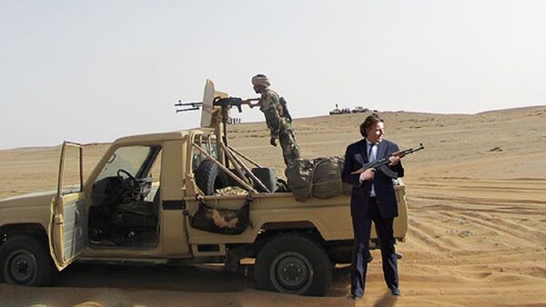 A photo of a pickup truck as delivered by the Netherlands to armed groups in Syria, with photoshopped in it former Dutch minister Bert Koenders of Foreign Affairs who initiated the support to the groups - Sputnik International