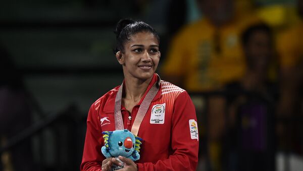 India's silver medallist Babita Kumari Phogat poses for photo during the medal ceremony of the women's freestyle 53kg wrestling event at the 2018 Gold Coast Commonwealth Games in the Carrara Sports Arena on the Gold Coast on April 12, 2018 - Sputnik International