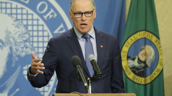 Washington Gov. Jay Inslee speaks during a news conference, Monday, April 13, 2020, at the Capitol in Olympia, Wash. Inslee appointed Pierce County Superior Court Judge G. Helen Whitener to the Washington Supreme Court to replace Justice Charles Wiggins, who retired from the court at the end of March - Sputnik International