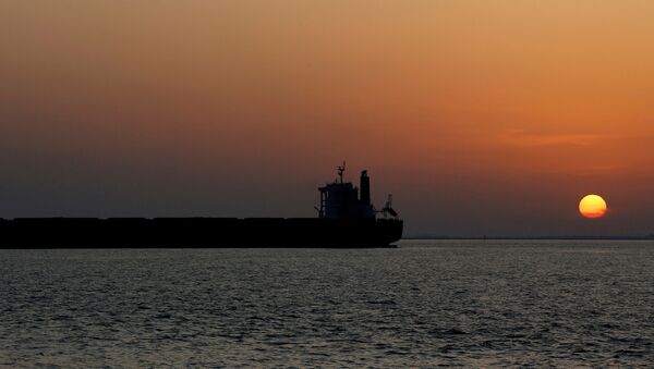 An oil tanker sits anchored off the Fos-Lavera oil hub near Marseille, France, September 17 - Sputnik International