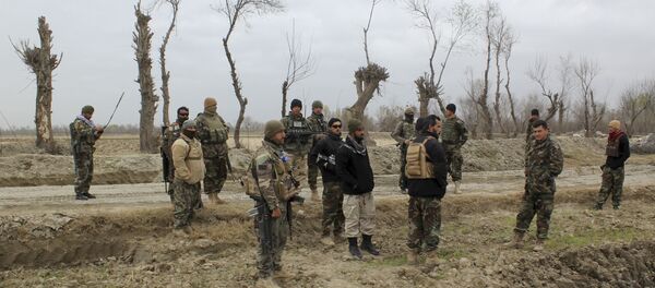Afghan security forces stand guard after an attack by Taliban militants near an Afghan National Army (ANA) outpost, in Kunduz Province on March 4, 2020. Afghan security forces stand guard after an attack by Taliban militants near an Afghan National Army (ANA) outpost, in Kunduz Province on March 4, 2020. - Sputnik International