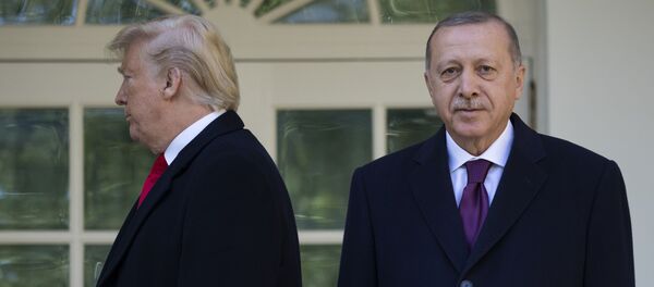 President Donald Trump walks off toward the Oval Office after posing for photographers with Turkish President Recep Tayyip Erdogan before a meeting in the Oval Office of the White House, Wednesday, Nov. 13, 2019, in Washington - Sputnik International
