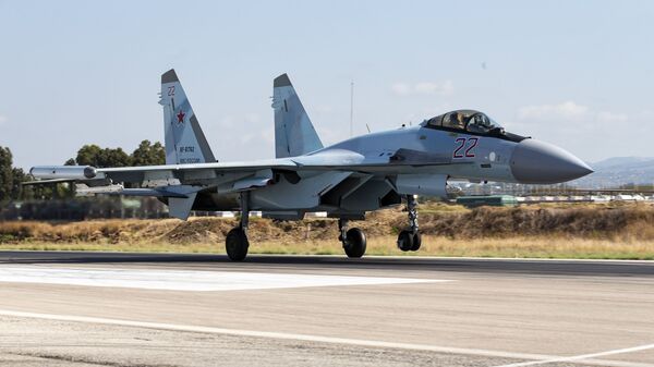 FILE - This Sept. 26, 2019 file photo, shows a Russian Su-35 fighter jet taking off at Hemeimeem air base in Syria - Sputnik International