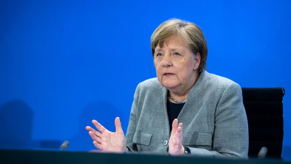 German Chancellor Angela Merkel addresses a press conference on German government's measures to avoid further spread of the novel coronavirus COVID-19, on April 15, 2020 following a video conference with the leaders of the German federal states at the chancellery in Berlin. - Sputnik International