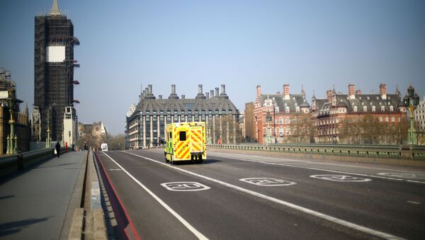 An ambulance is seen on Westminster bridge as the spread of the coronavirus disease (COVID-19) continues, in London, Britain April 9, 2020 - Sputnik International