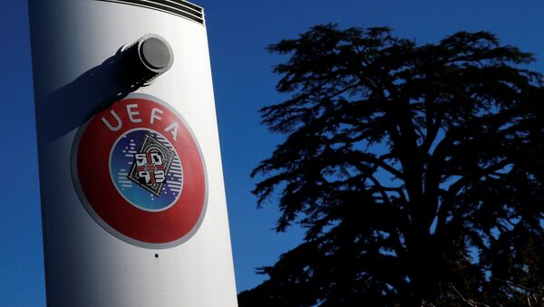 A logo is pictured outside the UEFA in Nyon, Switzerland, February 28, 2020 - Sputnik International