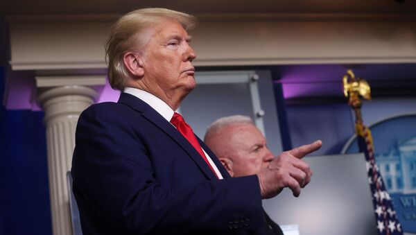 U.S. President Donald Trump participates in the daily coronavirus task force briefing with U.S. Assistant Secretary for Health Admiral Brett Giroir at his side at the White House in Washington, U.S., April 20, 2020 - Sputnik International