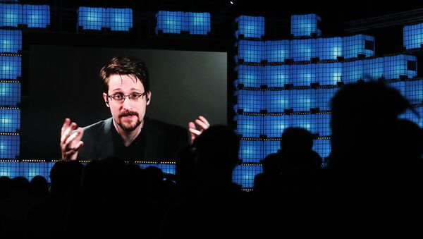 FILE - In this Nov. 4, 2019, file photo, former U.S. National Security Agency contractor Edward Snowden addresses attendees through video link at the Web Summit technology conference in Lisbon - Sputnik International