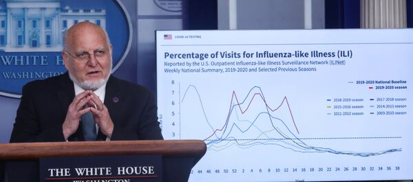 Centers for Disease Control (CDC) Director Robert Redfield explains illness surveillance programs in the United States in front of a chart showing statistics of patients seeking treatment for influenza-like illnesses during the daily coronavirus task force briefing at the White House in Washington, U.S., April 17, 2020. - Sputnik International