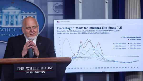 Centers for Disease Control (CDC) Director Robert Redfield explains illness surveillance programs in the United States in front of a chart showing statistics of patients seeking treatment for influenza-like illnesses during the daily coronavirus task force briefing at the White House in Washington, U.S., April 17, 2020. - Sputnik International