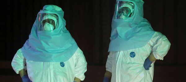 A medical worker collects samples during a simulation for drive-through polymerase chain reaction (PCR) tests for the coronavirus disease (COVID-19) at Edogawa ward in Tokyo, Japan - Sputnik International