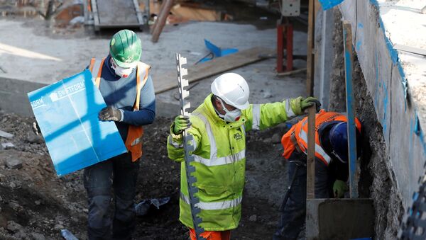 Construction workers work on a site in Chester-le-Street Britain - Sputnik International