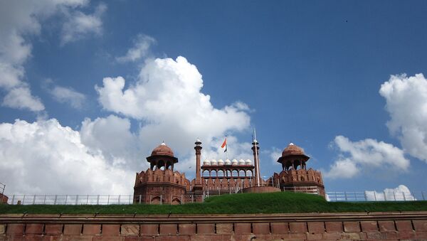 Indian national Flag waving under clear blue sky on Red Fort, Delhi - Sputnik International