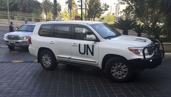 United Nations vehicles carry the team of the Organization for the Prohibition of Chemical Weapons (OPCW) - Sputnik International
