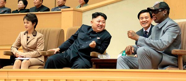 North Korean leader Kim Jong Un watches a basketball game with Dennis Rodman - Sputnik International