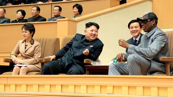 North Korean leader Kim Jong Un watches a basketball game with Dennis Rodman - Sputnik International