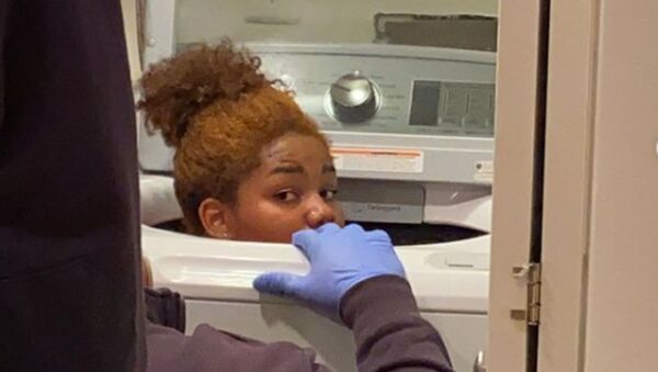 Quarantine Boredom: Woman Gets Stuck Inside Washing Machine  - Sputnik International
