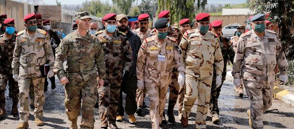 US-led coalition forces hand over base to Iraqi military in Nineveh US-led coalition forces hand over base to Iraqi military in Nineveh - Sputnik International