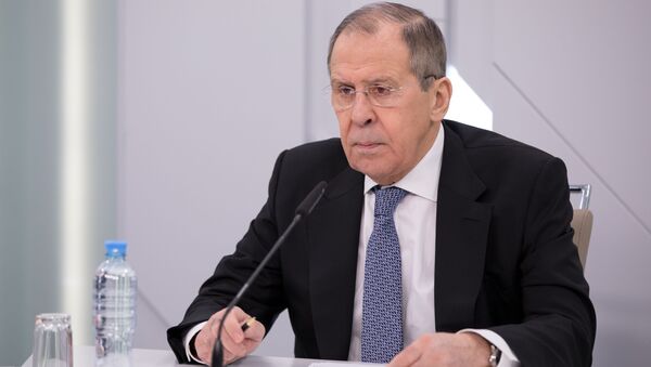 In this handout photo released by the Russian Foreign Ministry, Russian Foreign Minister Sergey Lavrov chairs a video conference meeting with the Alexander Gorchakov Public Diplomacy Fund's Board of Trustees, in Moscow, Russia - Sputnik International