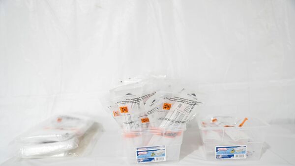 FILE PHOTO: Testing kits rest on a table at a One Medical testing facility built to help with the coronavirus disease (COVID-19) outbreak, in the Bronx borough of New York City, U.S., April 21, 2020 - Sputnik International