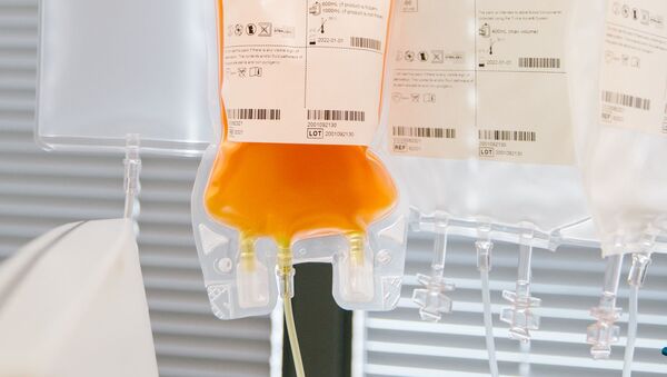 Convalescent plasma is collected from some of Britain's first-recovered COVID-19 patients as part of a clinical trial, to be transfused to patients struggling to fight the coronavirus disease (COVID-19), at Tooting Blood Donor Centre, in Tooting, London, Britain April 25, 2020 - Sputnik International