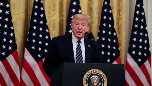U.S. President Donald Trump speaks about Trump Administration efforts to protect senior citizens from the coronavirus disease (COVID-19) pandemic during an event in the East Room at the White House in Washington, U.S., April 30, 2020 - Sputnik International