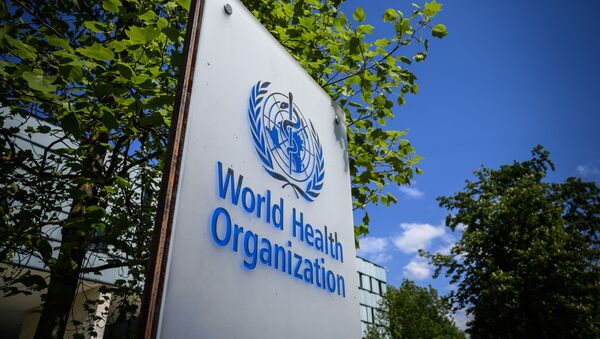 This picture taken on April 24, 2020 shows a sign of the World Health Organization (WHO) in Geneva next to their headquarters, amid the COVID-19 outbreak, caused by the novel coronavirus - Sputnik International