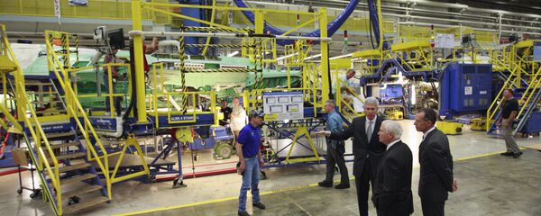 In this Aug. 31, 2009 file photo, Lockheed Martin Executive Vice President of the F-35 program Dan Crowley, left, and Lockheed Martin CEO Bob Stevens, right, guide then-Defense Secretary Robert Gates, center, through the F-35 Lightning II assembly line at Lockheed Martin Aeronautics Company in Fort Worth, Texas In this Aug. 31, 2009 file photo, Lockheed Martin Executive Vice President of the F-35 program Dan Crowley, left, and Lockheed Martin CEO Bob Stevens, right, guide then-Defense Secretary Robert Gates, center, through the F-35 Lightning II assembly line at Lockheed Martin Aeronautics Company in Fort Worth, Texas - Sputnik International