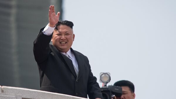 This file photo taken on April 15, 2017 shows North Korean leader Kim Jong Un waving from a balcony of the Grand People's Study House following a military parade marking the 105th anniversary of the birth of late North Korean leader Kim Il-Sung in Pyongyang. - Sputnik International