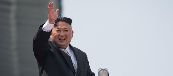 This file photo taken on April 15, 2017 shows North Korean leader Kim Jong Un waving from a balcony of the Grand People's Study House following a military parade marking the 105th anniversary of the birth of late North Korean leader Kim Il-Sung in Pyongyang. This file photo taken on April 15, 2017 shows North Korean leader Kim Jong Un waving from a balcony of the Grand People's Study House following a military parade marking the 105th anniversary of the birth of late North Korean leader Kim Il-Sung in Pyongyang. - Sputnik International