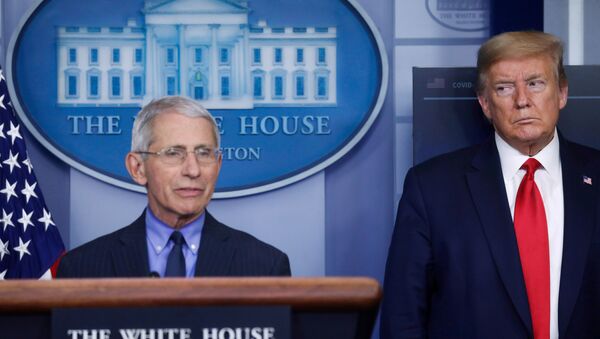 U.S. President Donald Trump looks at National Institute of Allergy and Infectious Diseases Director Dr. Anthony Fauci as Fauci answers a question during the daily coronavirus task force briefing at the White House in Washington, U.S., April 17, 2020 - Sputnik International