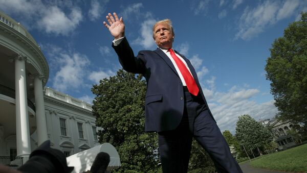 U.S. President Donald Trump waves as he departs on travel to the Camp David presidential retreat from the South Lawn at the White House in Washington, U.S., May 1, 2020 - Sputnik International