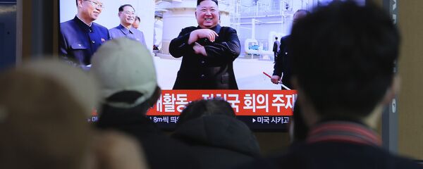 People watch a TV showing an image of North Korean leader Kim Jong Un during a news program at the Seoul Railway Station in Seoul, South Korea, Saturday, 2 May 2020. Kim made his first public appearance in 20 days as he celebrated the completion of a fertilizer factory near Pyongyang. People watch a TV showing an image of North Korean leader Kim Jong Un during a news program at the Seoul Railway Station in Seoul, South Korea, Saturday, 2 May 2020. Kim made his first public appearance in 20 days as he celebrated the completion of a fertilizer factory near Pyongyang. - Sputnik International