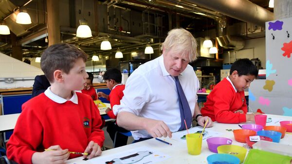 Britain's Prime Minister Boris Johnson (C) participates in a workshop with children from the Richard Avenue Primary School prior to chairing a cabinet meeting at the National Glass Centre at the University of Sunderland, in Sunderland, northeast England on January 31, 2020, the day that the UK formally leaves the European Union - Sputnik International
