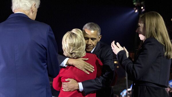 Democratic presidential candidate Hillary Clinton, accompanied by her daughter Chelsea Clinton, right, and former President Bill Clinton, left, hugs President Barack Obama after speaking at a rally at Independence Mall in Philadelphia, Monday, Nov. 7, 2016 - Sputnik International