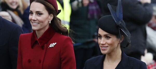 FILE - In this Tuesday, Dec. 25, 2018 file photo, Britain's Kate, Duchess of Cambridge, left, and Meghan, Duchess of Sussex arrive to attend the Christmas day service at St Mary Magdalene Church in Sandringham in Norfolk, England - Sputnik International