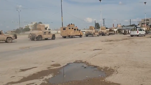 SDF vehicles move to quash a Daesh (ISIS) prisoner uprising in Hasakah, northeast Syria. May 3, 2020. - Sputnik International