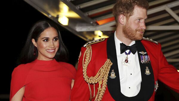 In this Saturday March 7, 2020 file photo, Britain's Prince Harry and Meghan, Duchess of Sussex arrive at the Royal Albert Hall in London. Meghan, Duchess of Sussex has her first post-royal job: narrating a Disney documentary about elephants - Sputnik International