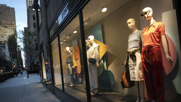 A window display at a J Crew store overlooks a quiet Rockefeller Center, Saturday, May 2, 2020, in New York. On April 30, the company announced it would apply for bankruptcy protection amidst the COVID-19 pandemic - Sputnik International