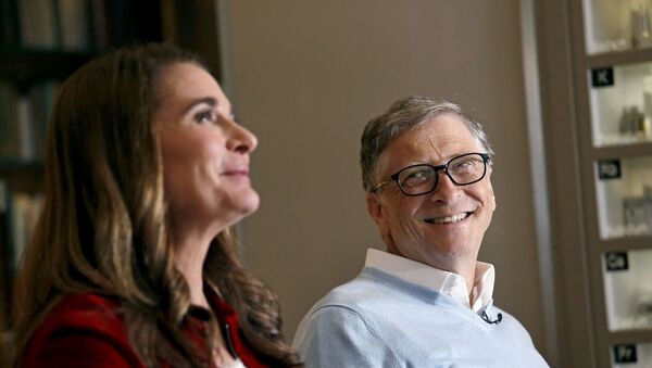 In this Feb. 1, 2019 photo, Bill Gates looks to his wife Melinda as they are interviewed in Kirkland, Wash. The couple, whose foundation has the largest endowment in the world, are pushing back against a new wave of criticism about whether billionaire philanthropy is a force for good. They said they’re not fazed by recent blowback against wealthy giving, including viral moments at the World Economic Forum and the shifting political conversation about taxes and socialism.  - Sputnik International