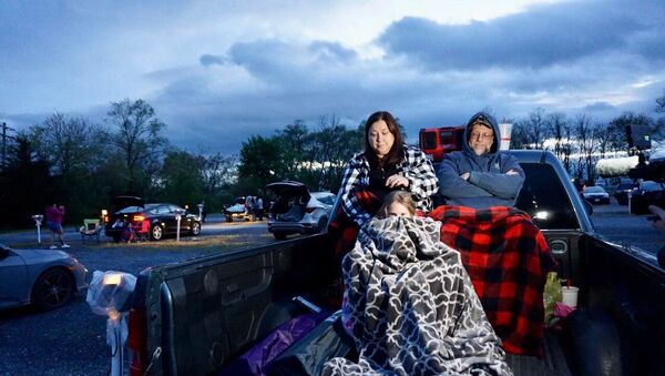 A family attending a drive-in movie theater in the Virginia countryside, U.S. - Sputnik International